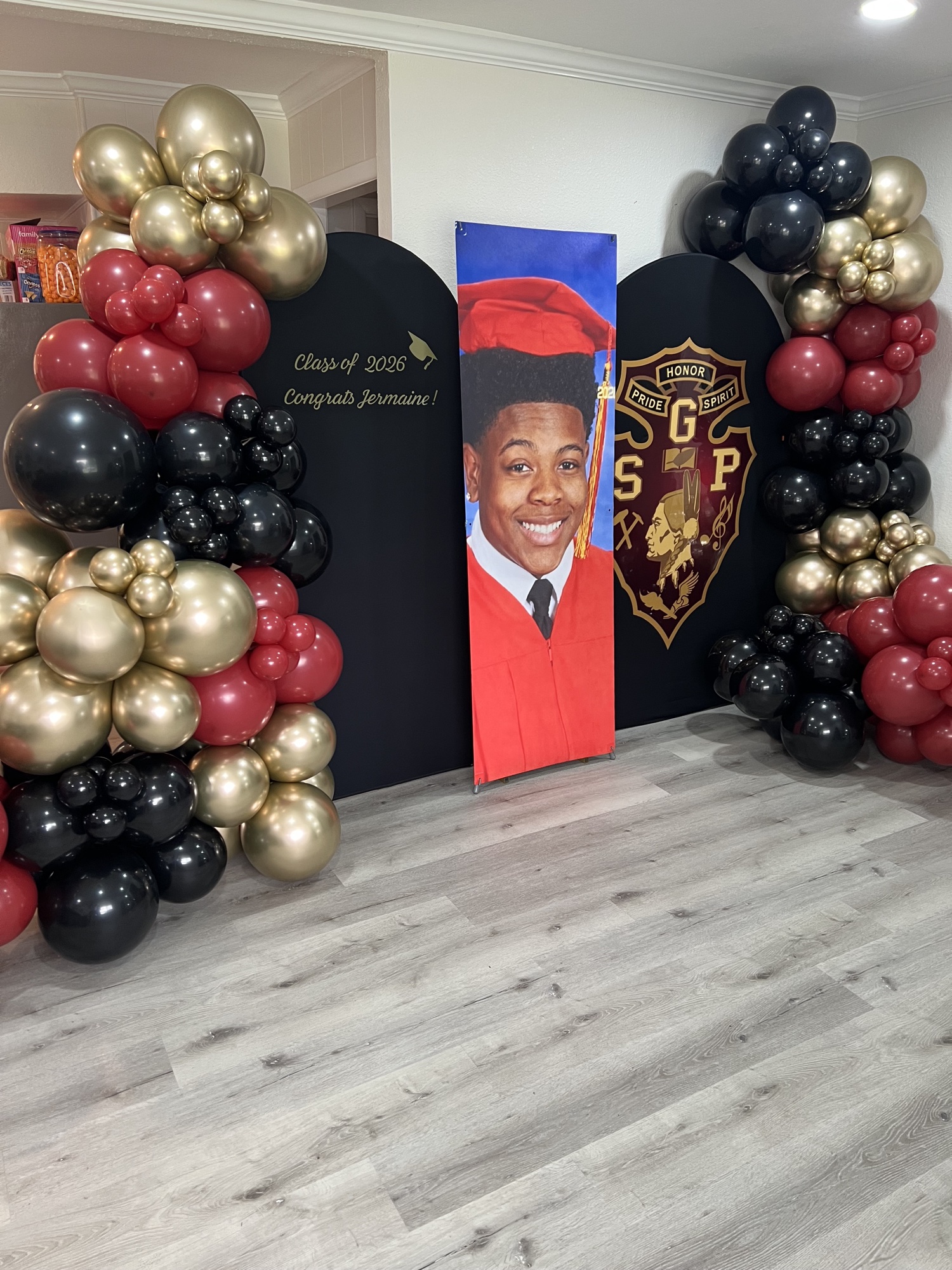 Graduation balloon installation for Jermaine.